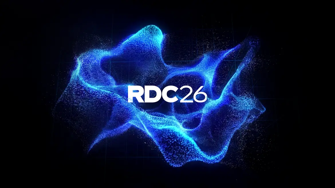 RDC26 Roblox Developers Conference 2026 logo on a blue particle background